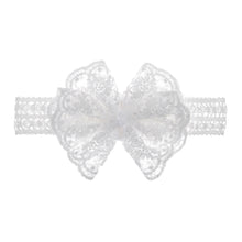 Carregar imagem no visualizador da galeria, Vincha con moño de encajes
