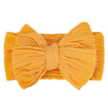 Carregar imagem no visualizador da galeria, Vincha con relieve y moño
