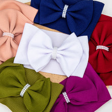 Carregar imagem no visualizador da galeria, Vincha con moño, detalles de perlas
