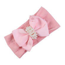 Carregar imagem no visualizador da galeria, Vincha con moño y perlas
