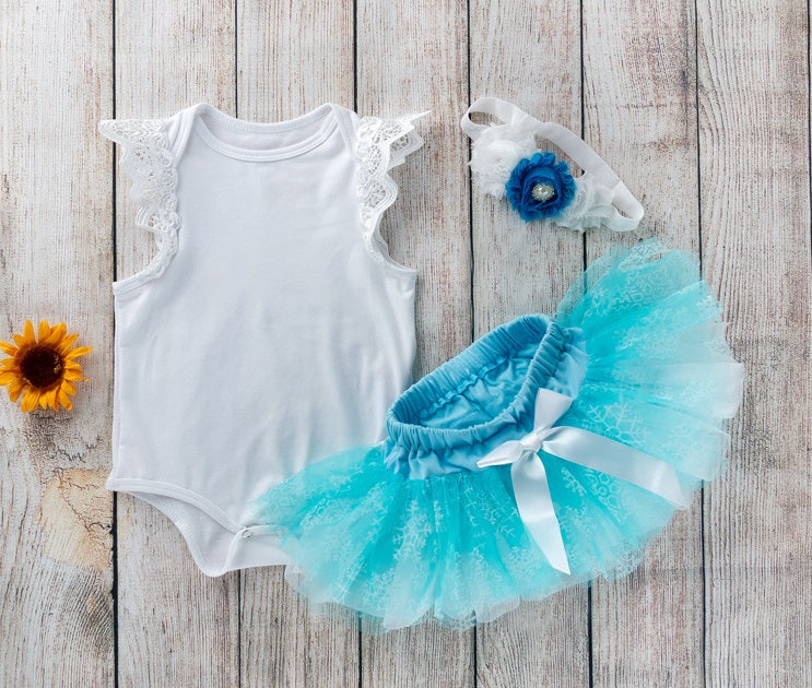 Body blanco con pollera tutu celeste copo de nieve Frozen incluye vincha