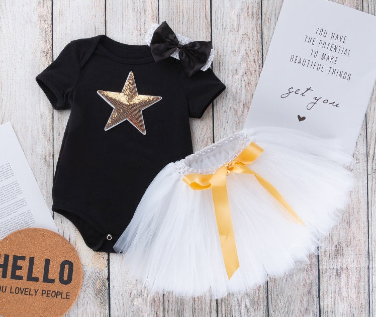 Body negro con estrella y pollera tutu blanco