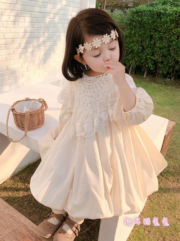 Vestido crema mangas largas abullonadas con pechero de encaje