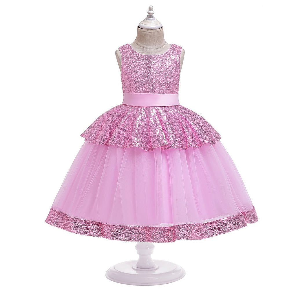 Vestido con lentejuelas rosa y moño