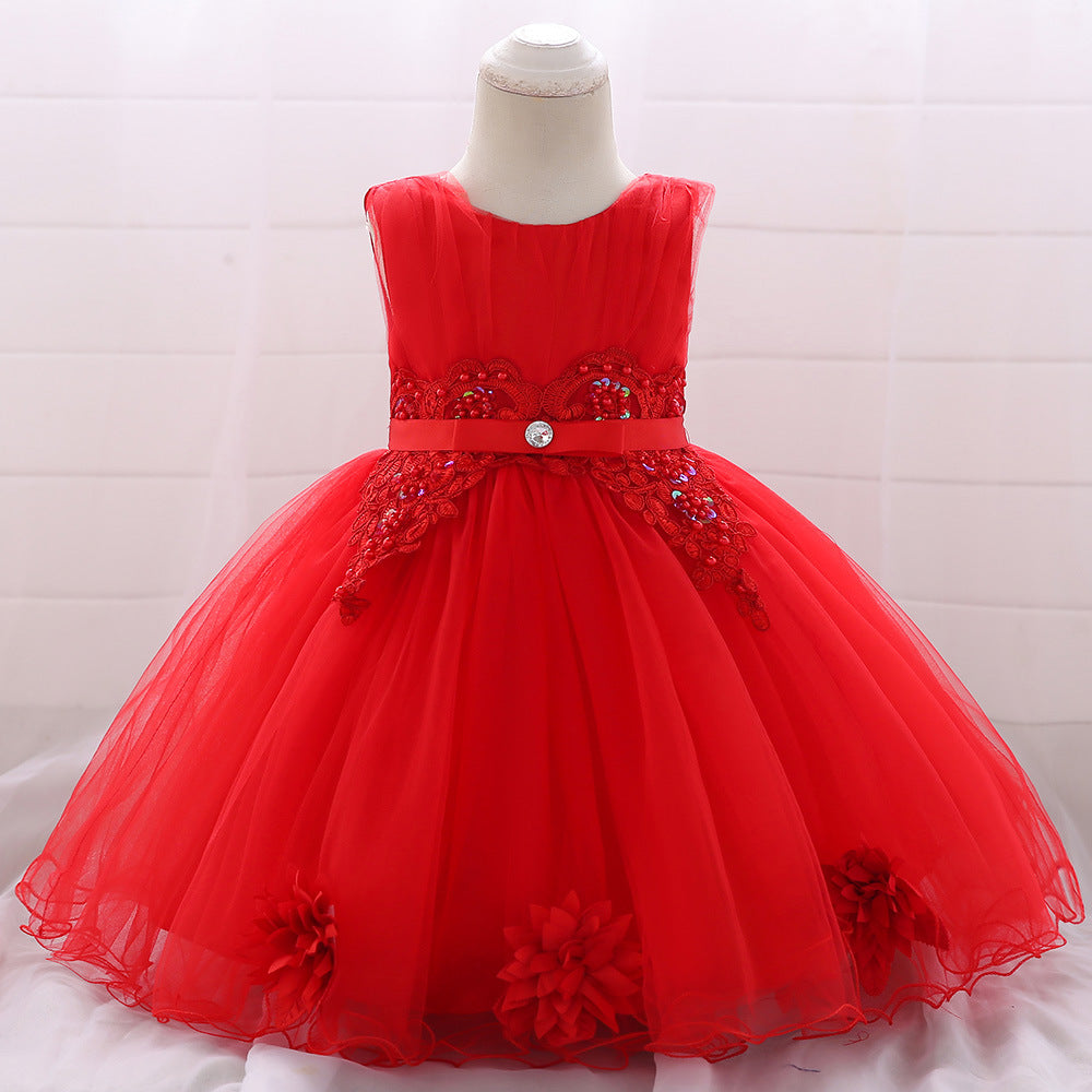 Vestido rojo con detalle de flor en la cola