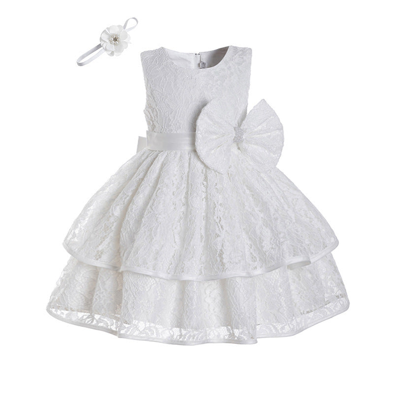 Vestido elegante blanco, con encaje escalonado y moño, vincha incluido