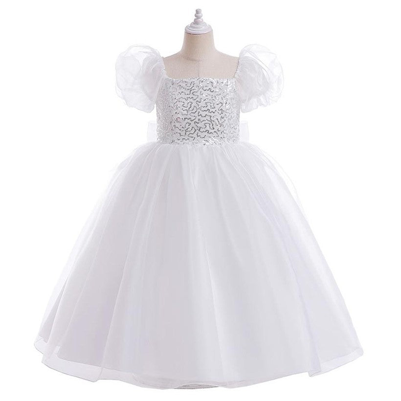 Vestido blanco largo con mangas abullonadas detalles de lentejuelas y moño