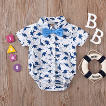 Cargar imagen en el visor de la galería, Camisa body blanco estampado azul de dinosaurio, moño
