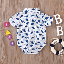 Cargar imagen en el visor de la galería, Camisa body blanco estampado azul de dinosaurio, moño
