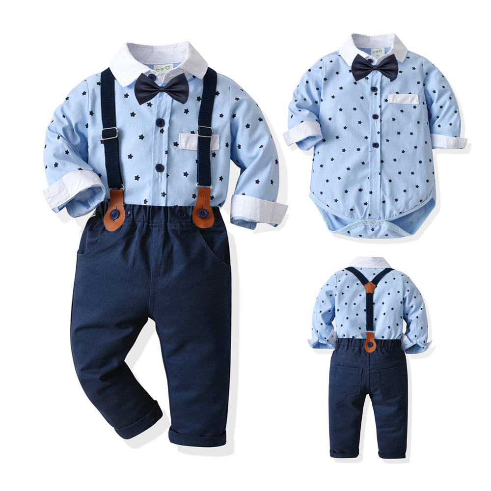 Body camisa media manga celeste con cuello blanco detalles de estrellas, moño y pantalón azul marino con tirante