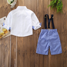 Cargar imagen en el visor de la galería, Camisa blanca manga media, moño, short azul y tirantes
