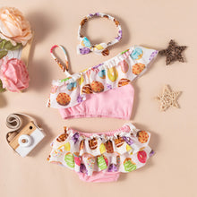 Cargar imagen en el visor de la galería, Blusa crop top, cubre pañal con volados, estampa de donas y postres, vincha incluido
